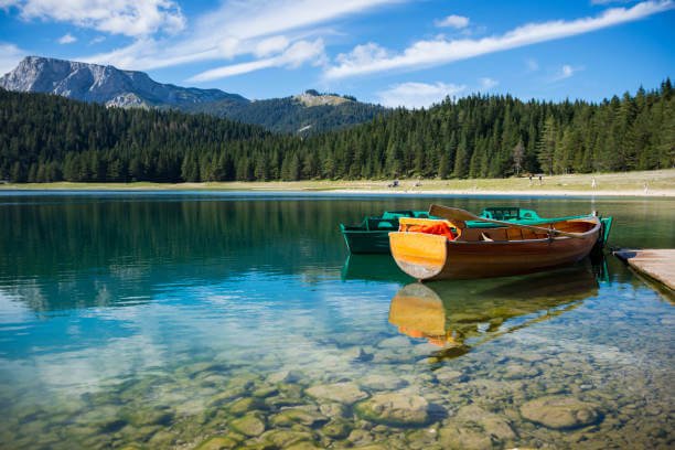 Lake Durmitor National Park Montenegro deep turquoise glacial lake surrounded by pine forest and mountain