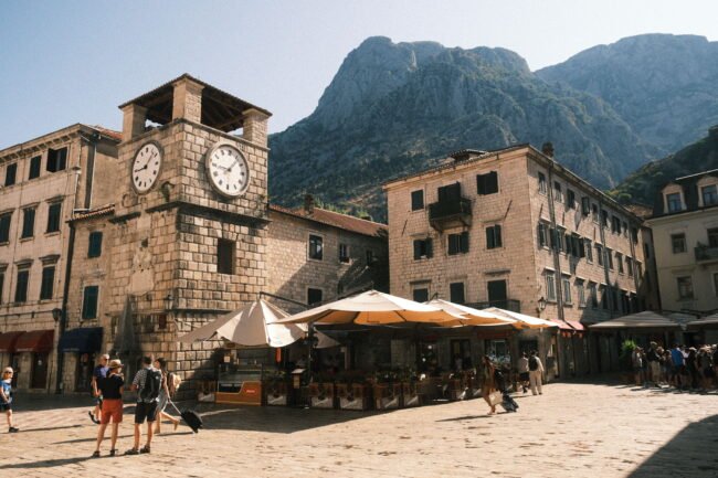 Montenegro in winter January Kotor Old Town completely empty in morning mist with the Bay of Kotor calm and reflective