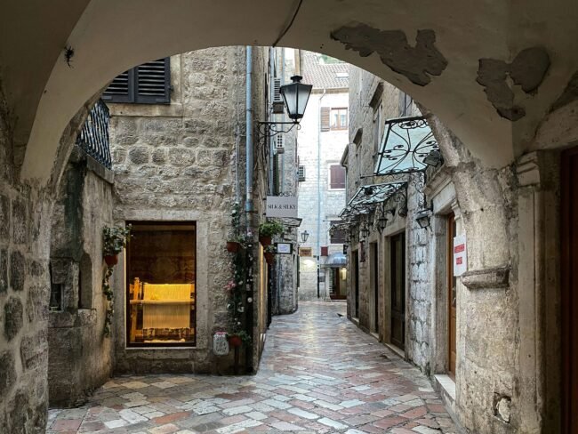  Old Town Montenegro narrow cobblestone medieval streets with stone buildings 